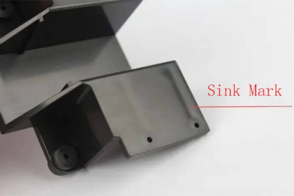 what-causes-sink-marks-in-injection-molded-parts-mould-clamps